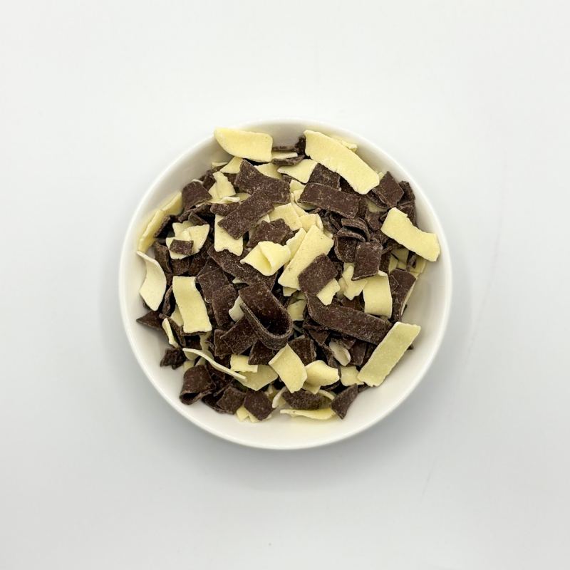 Mix of dark chocolate and white decoration flakes